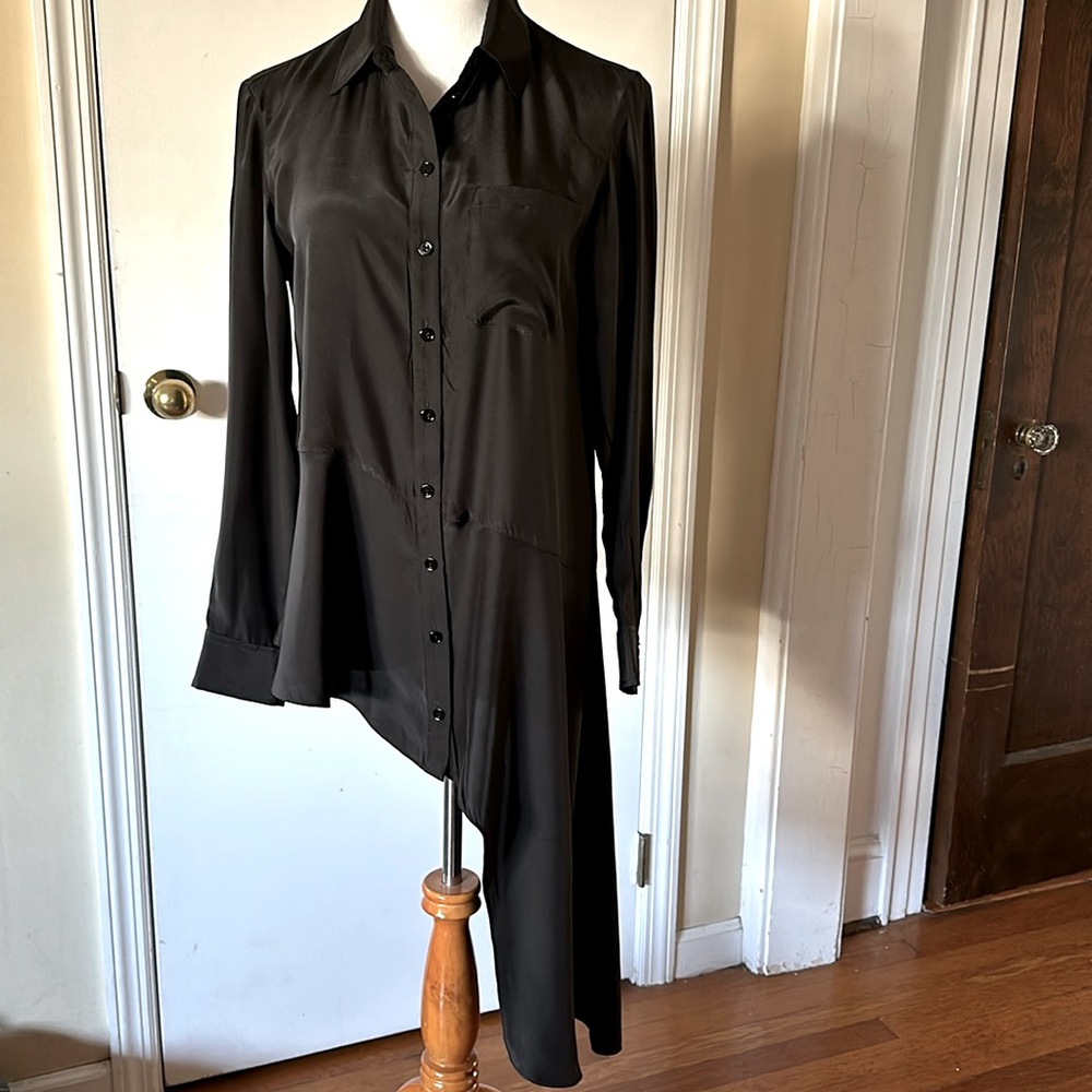 Nanette Lepore black top with angle hem.
